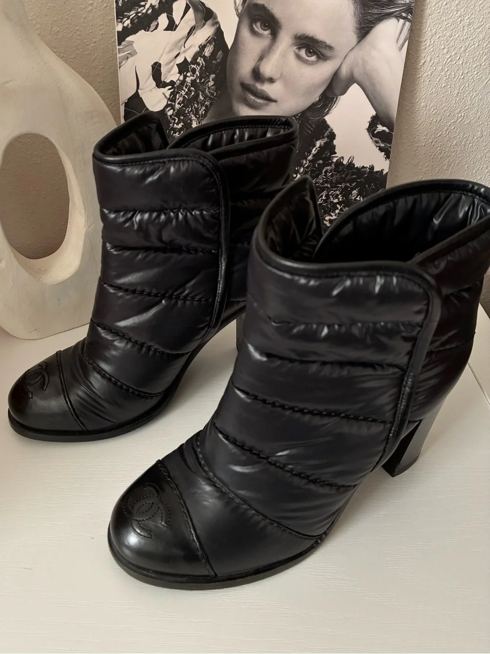 CHANEL Black Quilted Puff Leather Ankle Boots with Logo Cap Toe